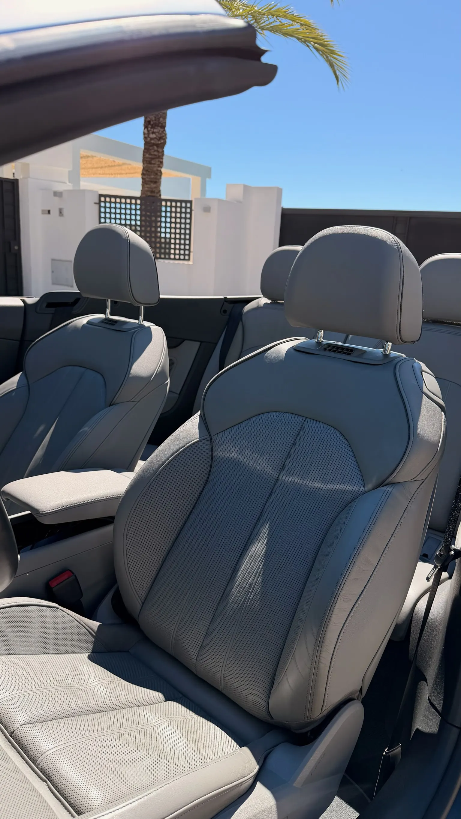 Audi A5 Convertible's perforated Rotor Grey leather seats with Neck Warmer integrated into the headrests