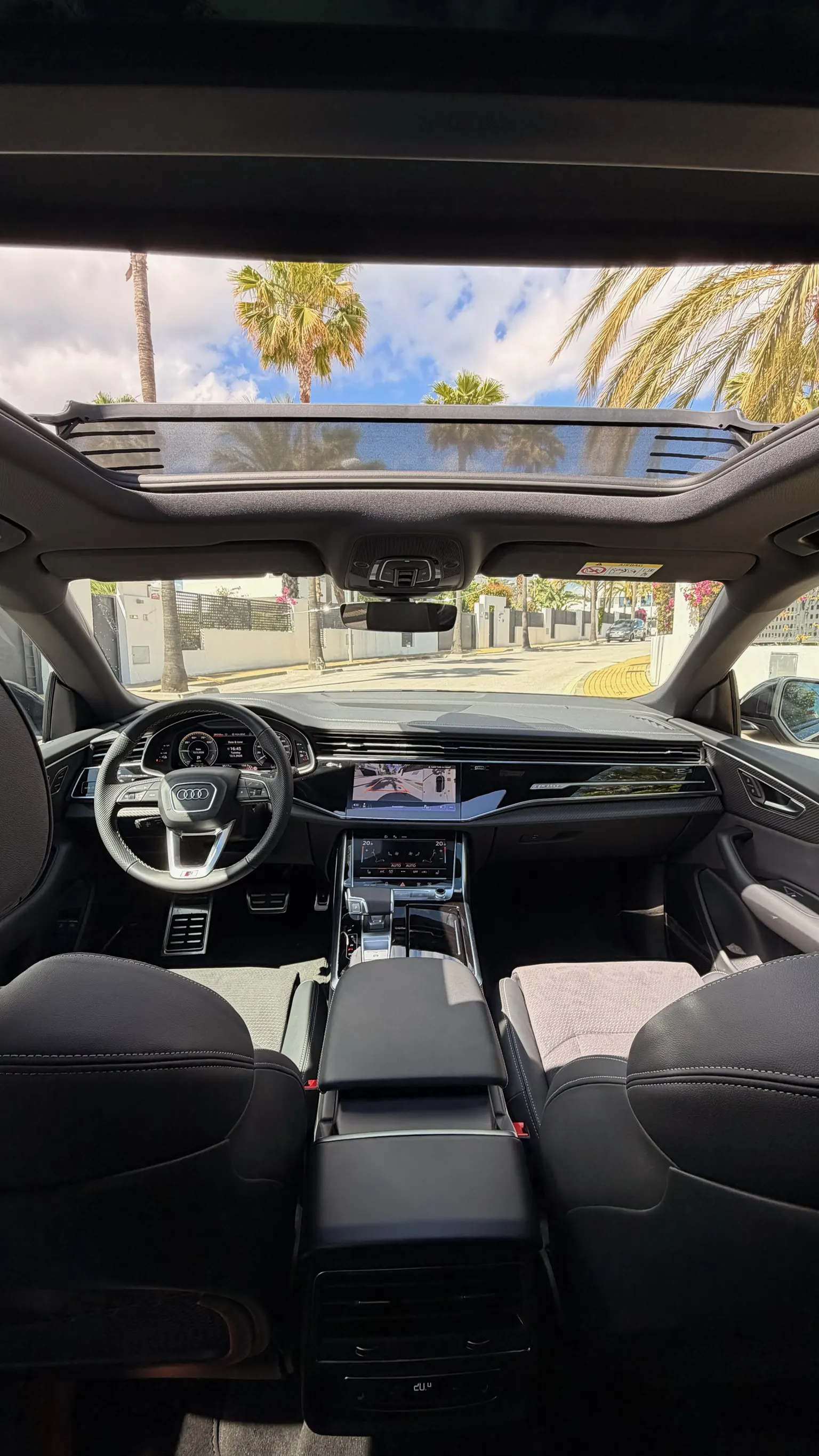 Audi Q8 S Line sport seats in black leather and Alcantara with contrast white stitching, embossed S logo on headrests and panoramic roof